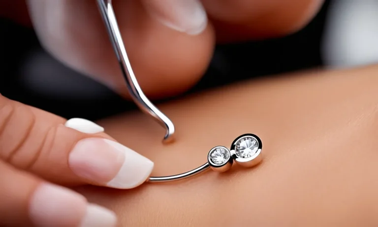 What To Do When Your Belly Button Ring Is Hanging By A Thread
